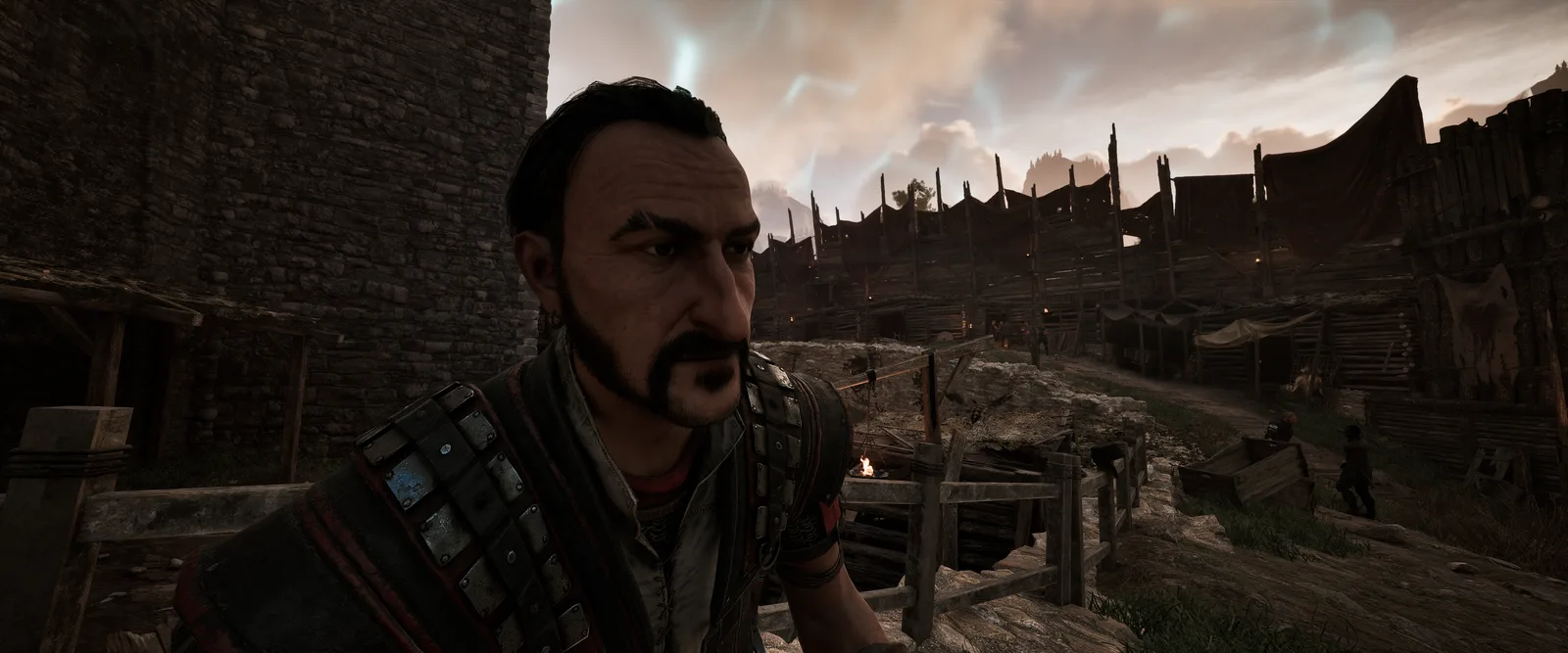 Diego in the outer ring of the Old Camp, behind it huts and the palisade, Gothic 1 Remake